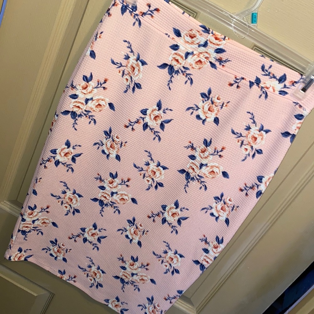 Cute floral skirt with bumble gum pink background